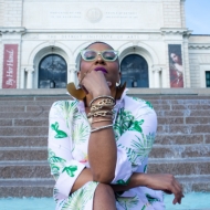Person sitting on museum steps
